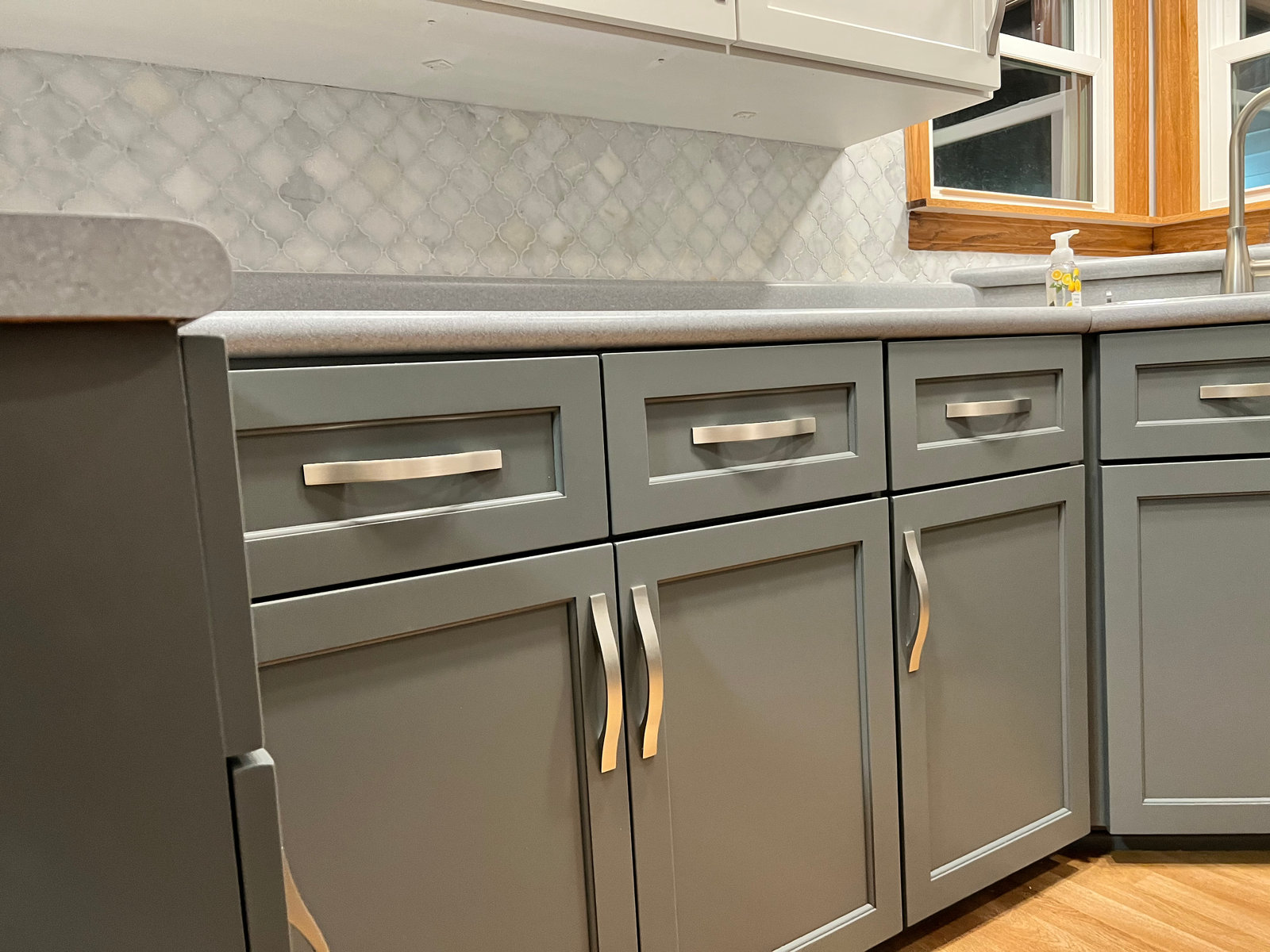 Cabinet doors, hardware, and backsplash details