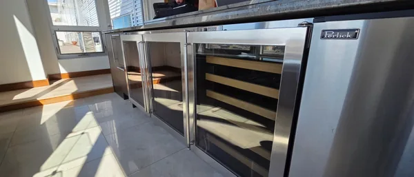 Undercounter refrigeration with stainless steel finishes.